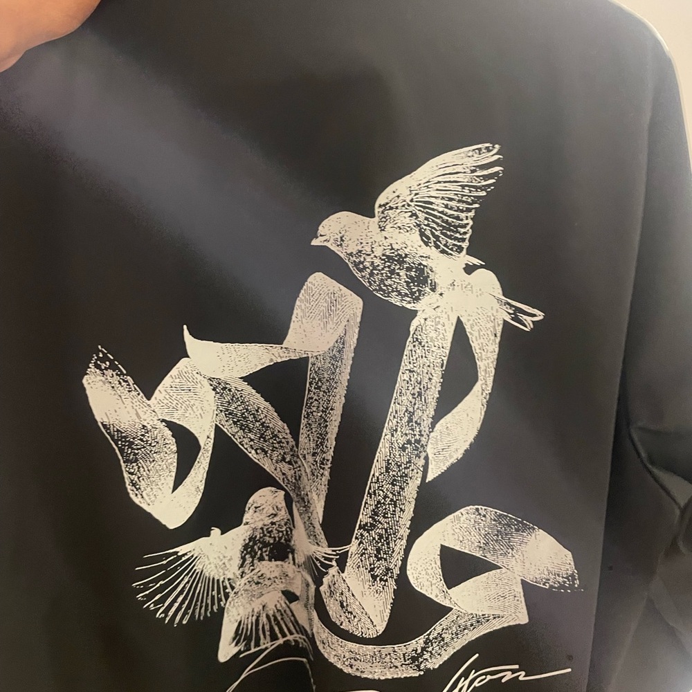 Black Graphic Sweatshirt with Bird Design